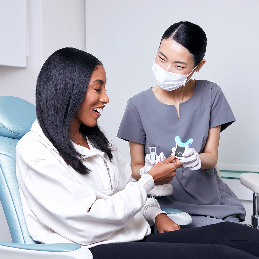 Is A Teeth Whitening Business Profitable? - Talking with a patient